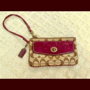 Coach Wristlet with purple velvet